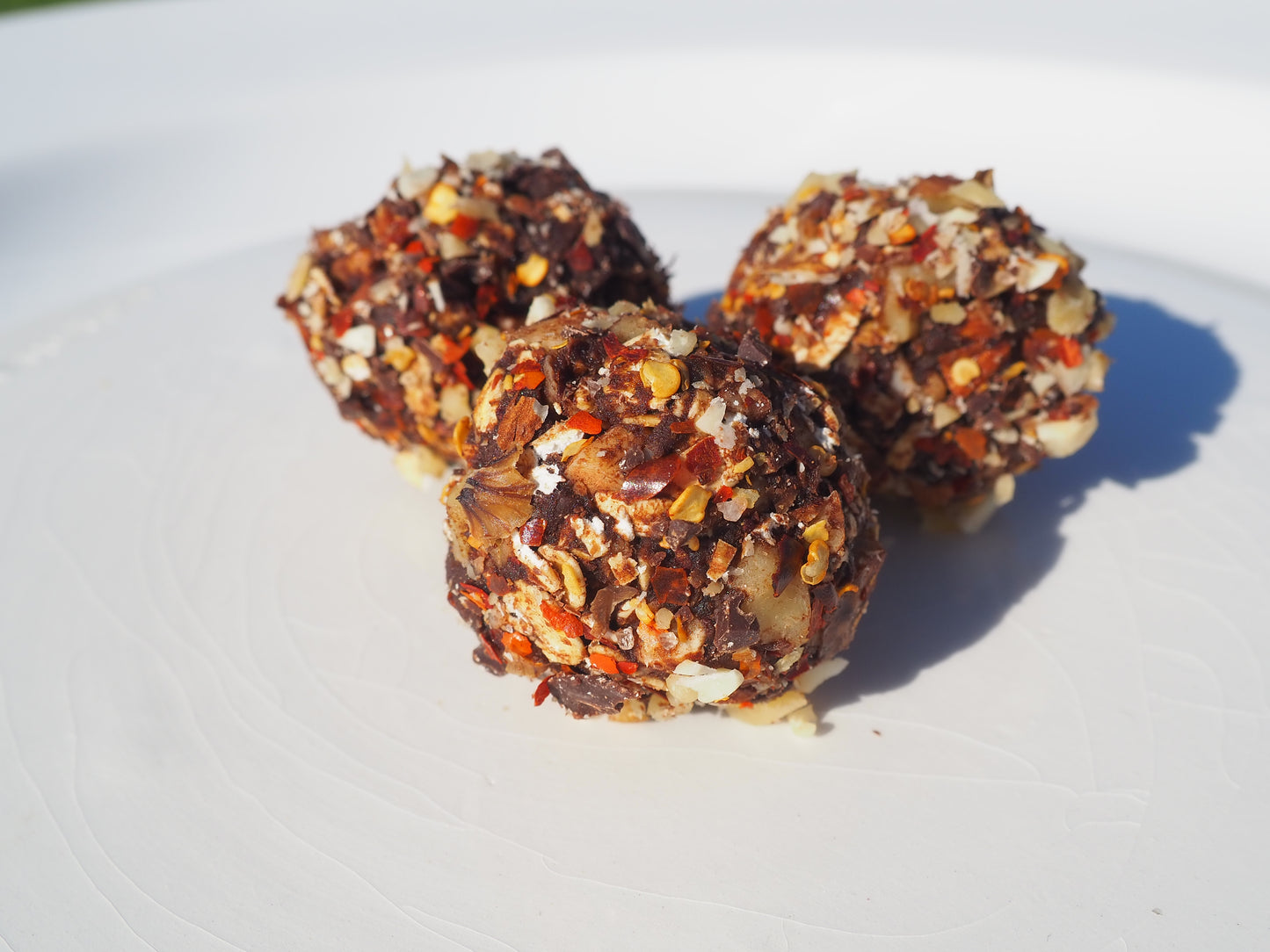 NOW – A bite with oat, walnut, almonds, cacao powder, dates, chili flakes, salt,  70% dark chocolate and Cordyceps